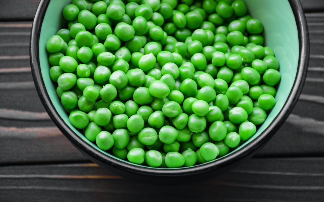 Bowl of peas. Peas are a great source of folate.