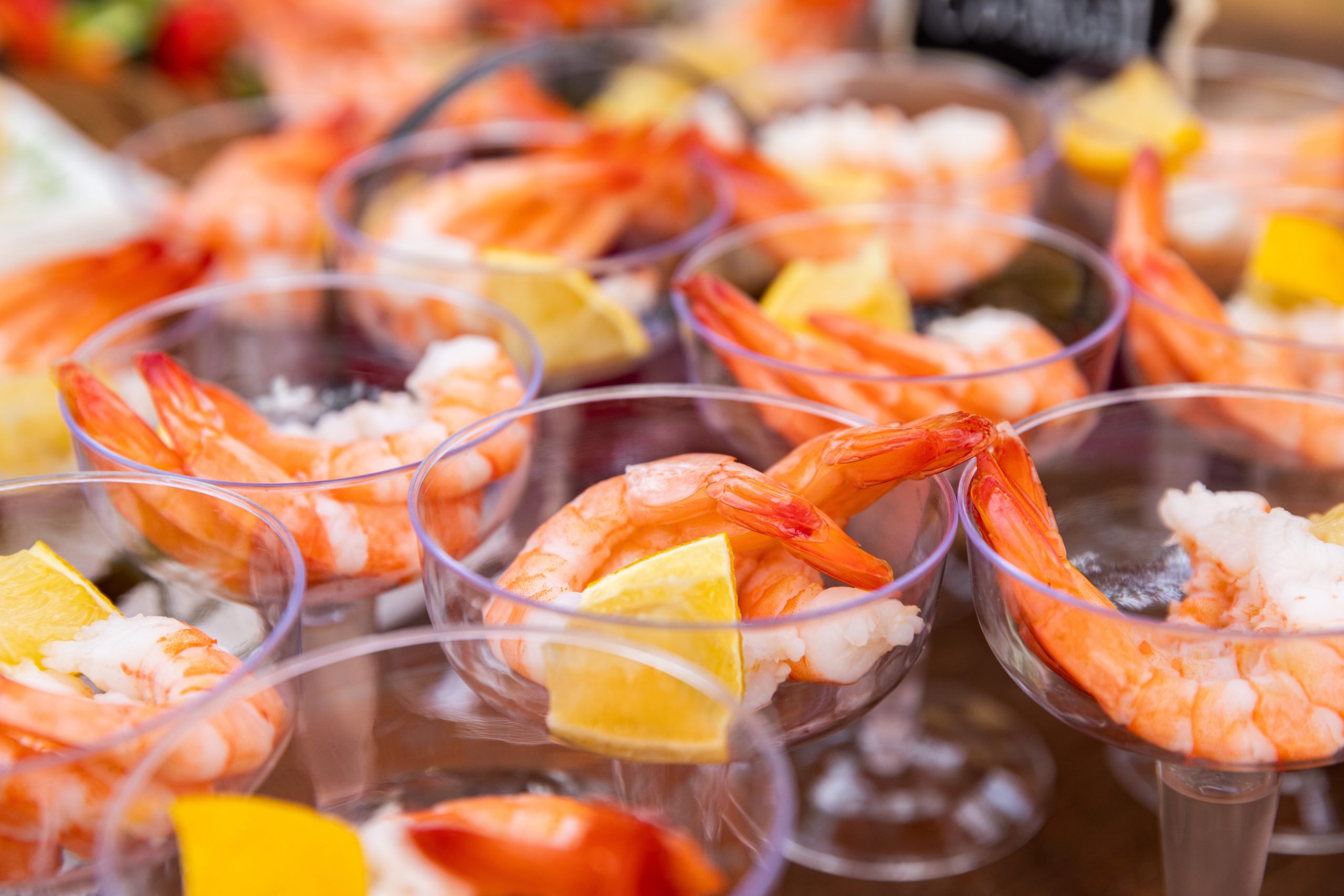 Cocktail bowls of shrimp with lemon. Shrimp is a great source of selenium
